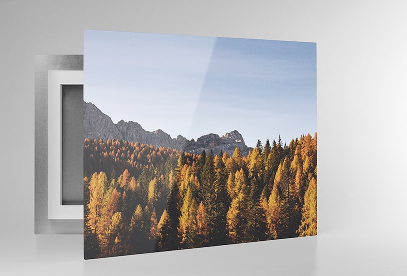 Floating frameless photograph on metal surface